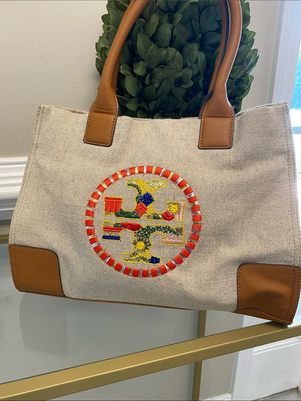 Tory Burch Canvas Tote with Tan Leather Trim and Embroidered Medallion